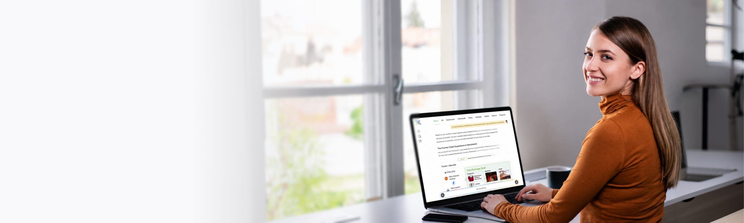 A business owner at a sunlit desk running her storefront in Xila on a laptop